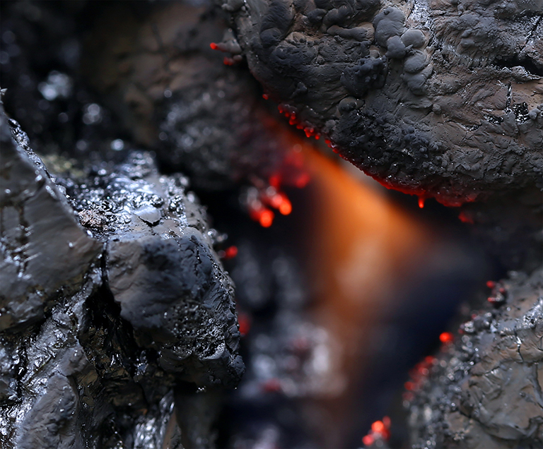 Black bituminous coal on fire